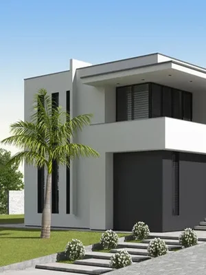 Modern white two-story home with black-framed windows and glass doors